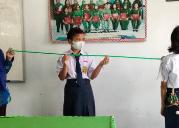 SMART UNIFORM (Seragam Pintar) Untuk Physical Distancing di SMPN GALANG” Oleh : Afni Zahara Harahap, S.Pd,Gr.,M.Pd
