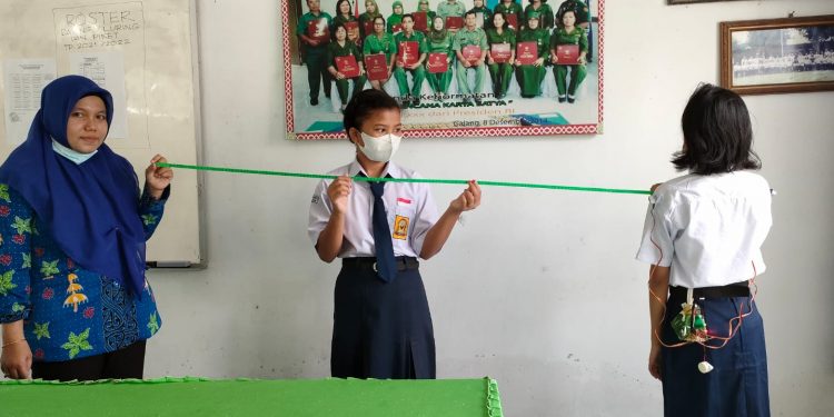 SMART UNIFORM (Seragam Pintar) Untuk Physical Distancing di SMPN GALANG” Oleh : Afni Zahara Harahap, S.Pd,Gr.,M.Pd