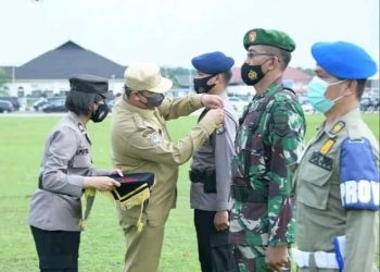 “Bupati Labuhanbatu Utara Pimpin Apel Gelar Pasukan Operasi Mantab   Huta Toba Tahun 2022”