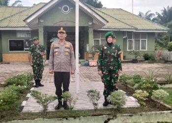 Perkokoh Soliditas dan Sinergitas TNI – Polri, Polsek Tanah Putih dan Koramil 02 Tanah Putih Gelar Apel Bersama