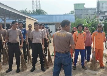 Polsek Kandis Gelar Giat Polisi Peduli Lingkungan