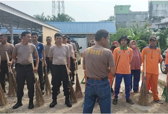 Polsek Kandis Gelar Giat Polisi Peduli Lingkungan