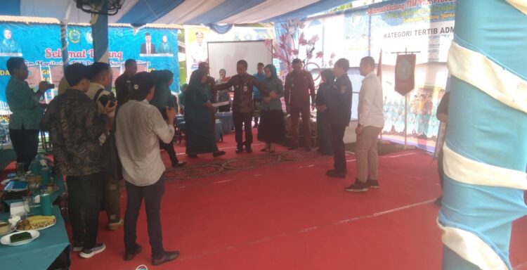 Pj.Bupati Paluta Bersama Tim Monitoring TP PKK Provinsi Sumatera Utara Didampingi Camat Halongonan Kunjungi Desa Napalatcat