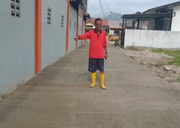 Penggunaan Dana Desa Hapoltahan Bangun Rabat  Beton di Huta Pancur dan Pea Tolong Tarutung